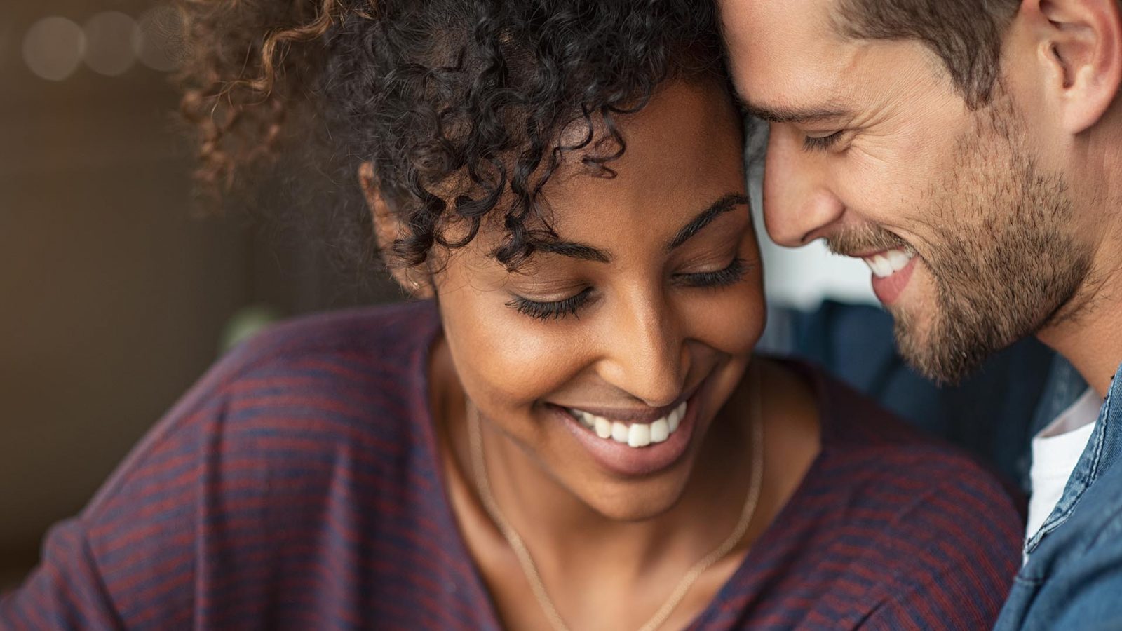 Portrait of attractive couple embracing each other.